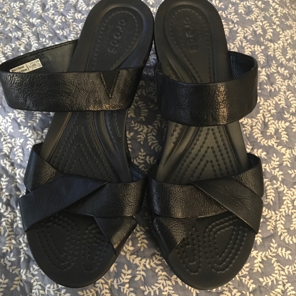 Crocs, wedge, never been worn, lost the receipt.